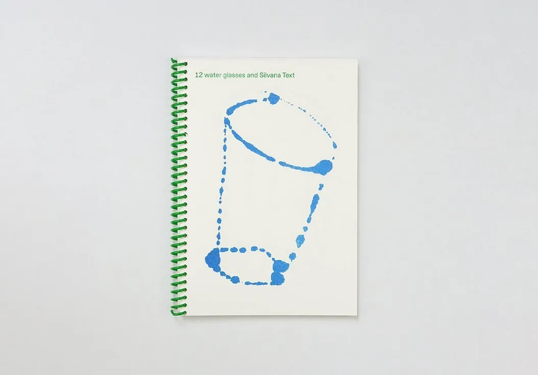 12 water glasses and Silvana text